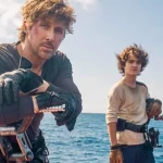 Ryan Gosling en Kade Auberon avec Flynn Gray dans Star Wars Starfighter, première image officielle